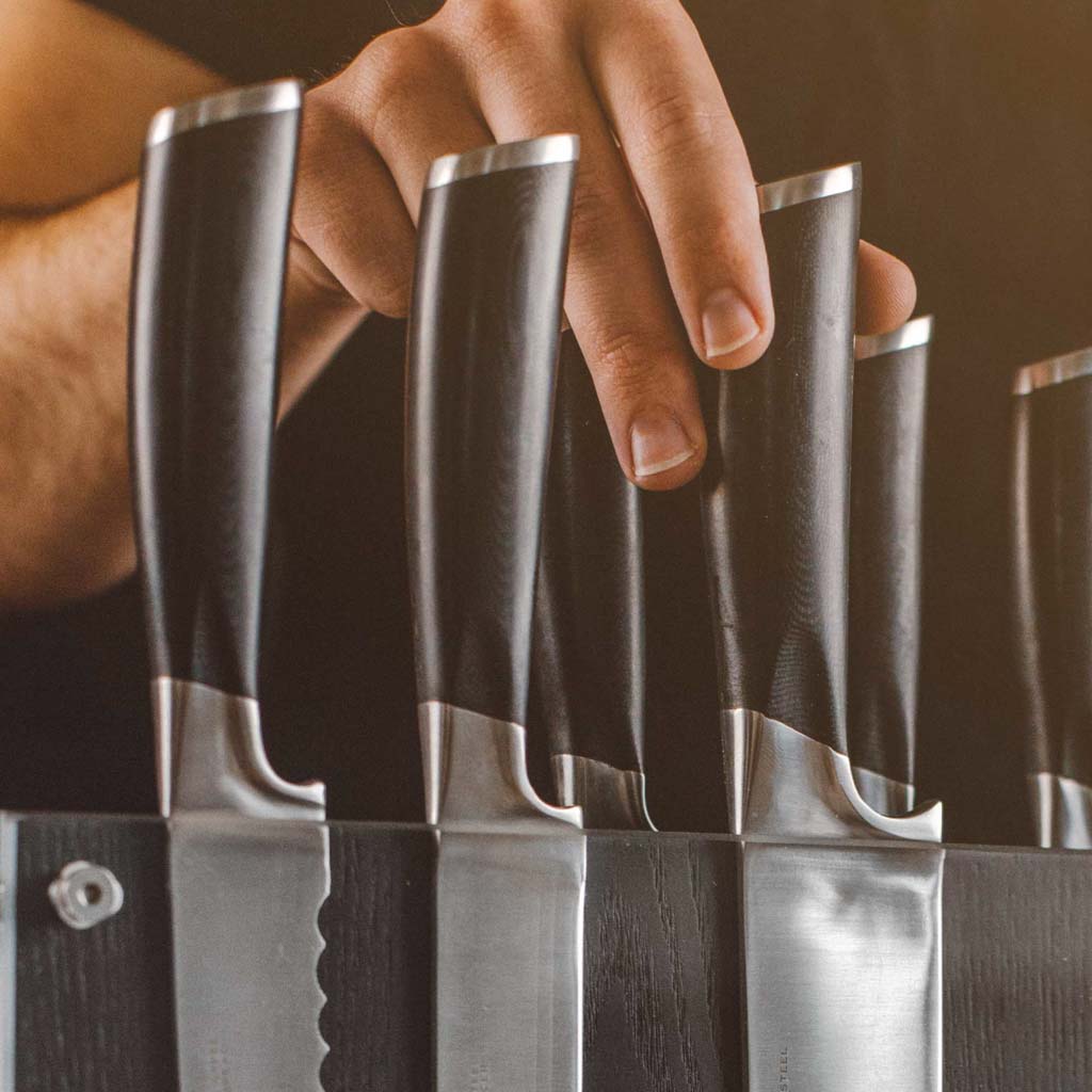 https://everlastly.com/cdn/shop/products/schmidt-brothers-kitchen-cutlery-schmidt-brothers-bonded-ash-7-piece-knife-set-high-carbon-stainless-steel-cutlery-with-black-ash-wood-and-acrylic-magnetic-knife-block-28383272206397.jpg?v=1678298753