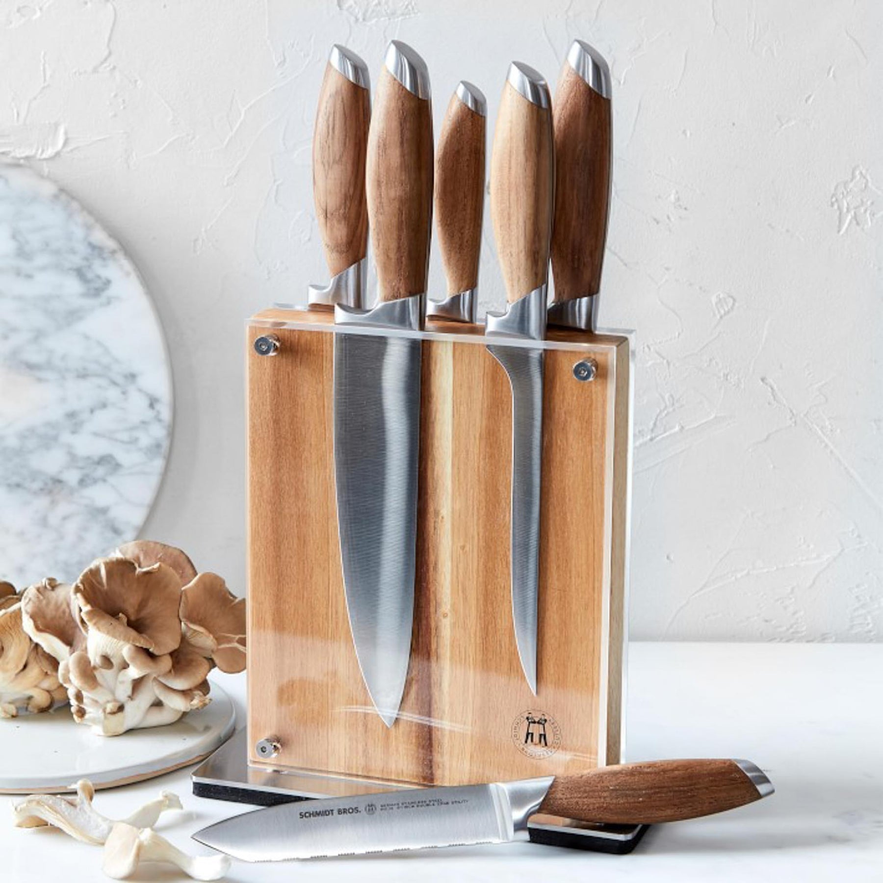 https://everlastly.com/cdn/shop/products/schmidt-brothers-kitchen-cutlery-schmidt-brothers-bonded-teak-7-piece-knife-set-high-carbon-stainless-steel-cutlery-with-acacia-and-acrylic-magnetic-knife-block-28288503480381_1800x18_dc44571a-54b4-43ba-95df-3e729e61ba41.jpg?v=1678297573