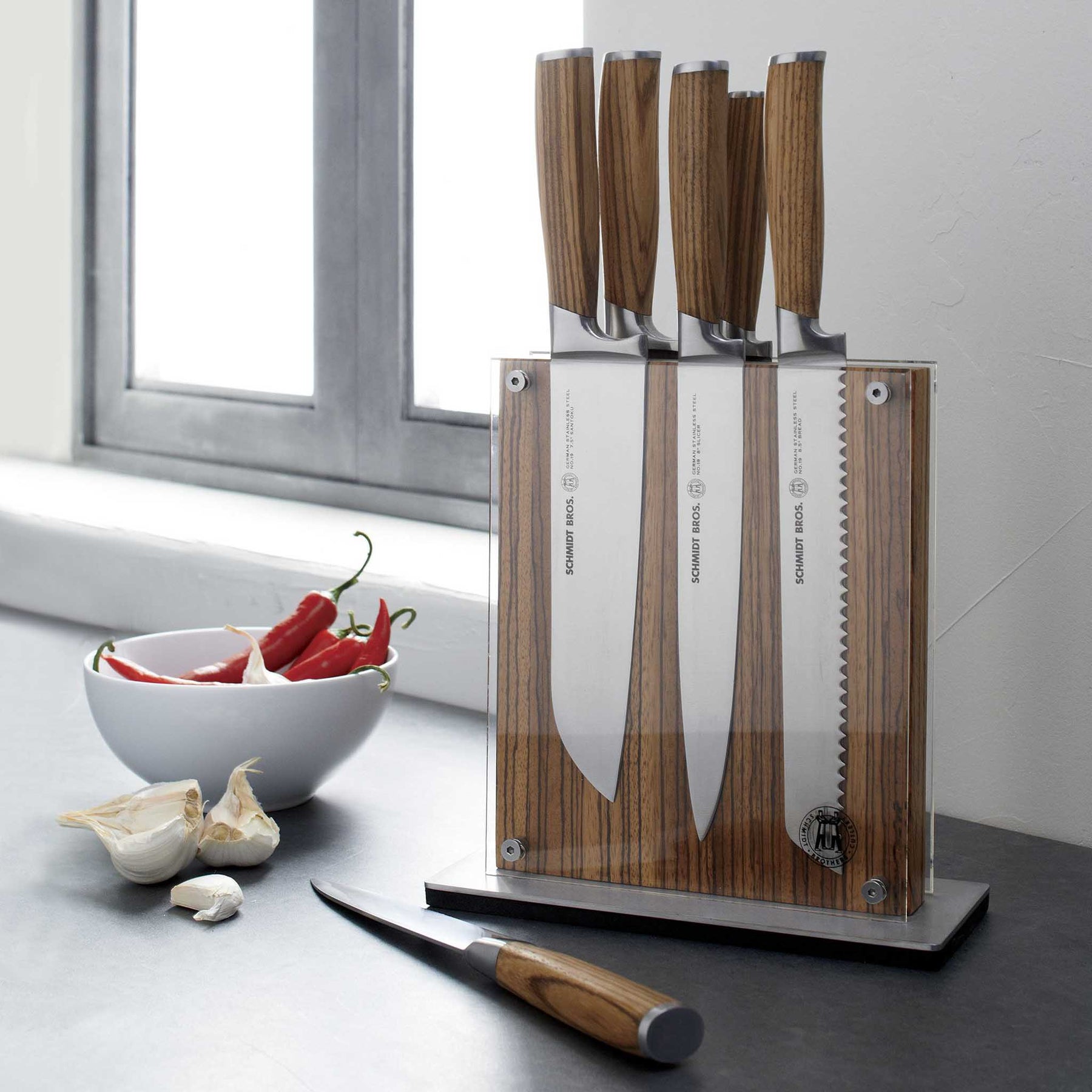https://everlastly.com/cdn/shop/products/schmidt-brothers-kitchen-cutlery-schmidt-brothers-zebra-wood-7-piece-knife-set-high-carbon-stainless-steel-cutlery-with-zebra-wood-and-acrylic-knife-block-28290675769405_1800x1800_29b90bee-e57b-48aa-ad31-d9093064adda.jpg?v=1677552717